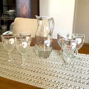 Gorgeous hand painted pitcher and six stemmed glasses